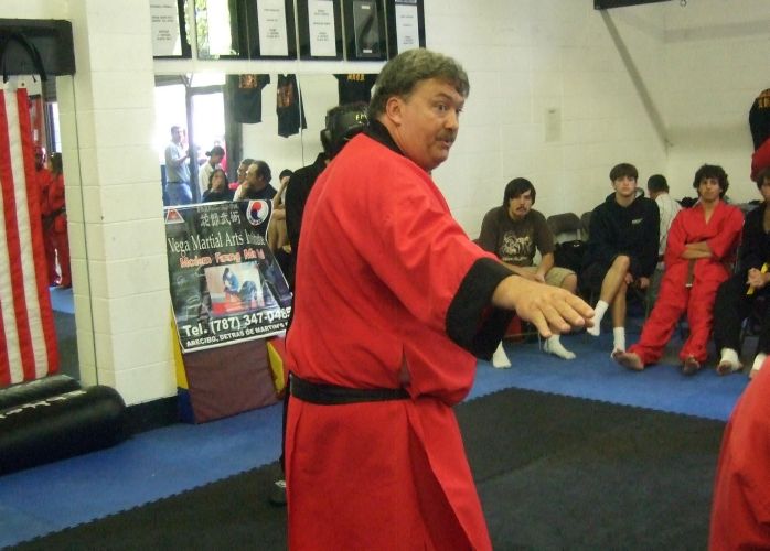 Inst. Earl Boyd controls the sparring action